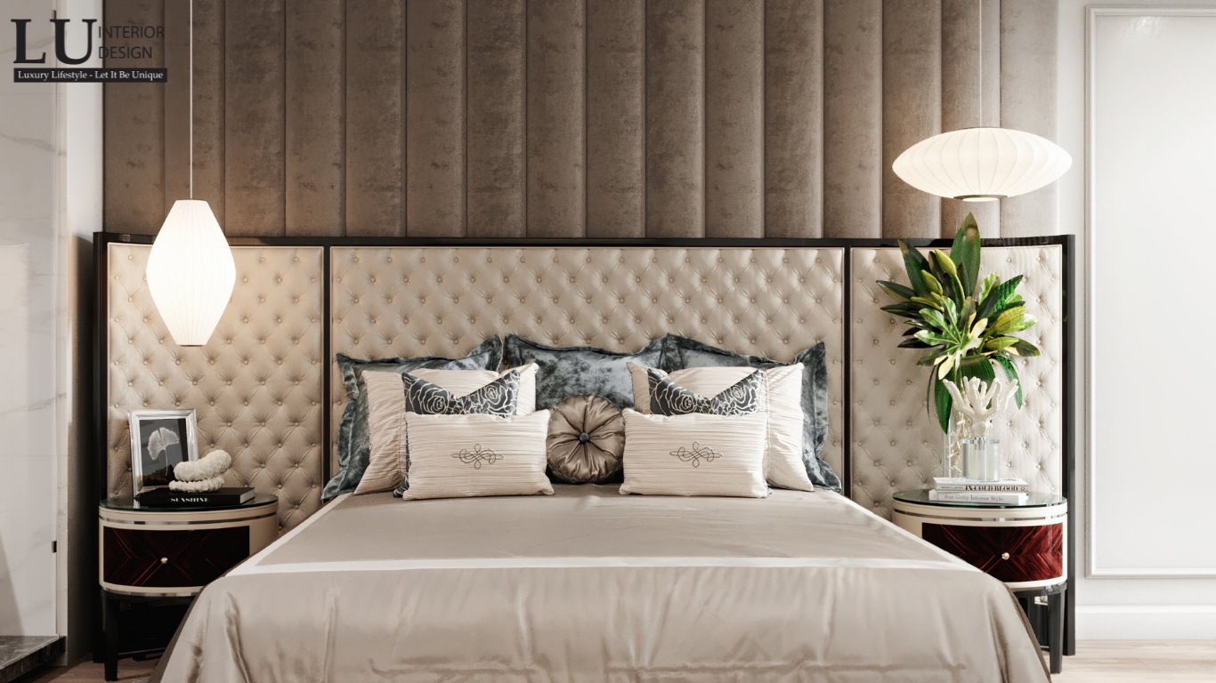  thiết kế nội thất phòng ngủ master penthouse Vũng Tàu hiện đại cổ điển với giường bọc da, đèn thả nghệ thuật và tab đầu giường cao cấp